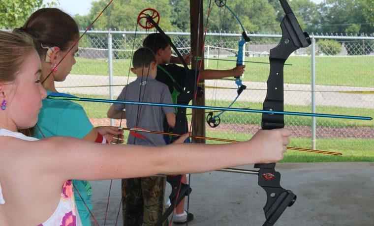 Kids shooting arrows